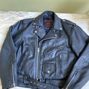 Men’s black leather motorcycle jacket. lined interior. Good condition.